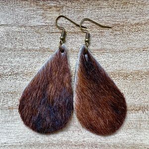 cowhide earrings. western fashion jewelry, brown cowhide, hair on hide. cowgirl